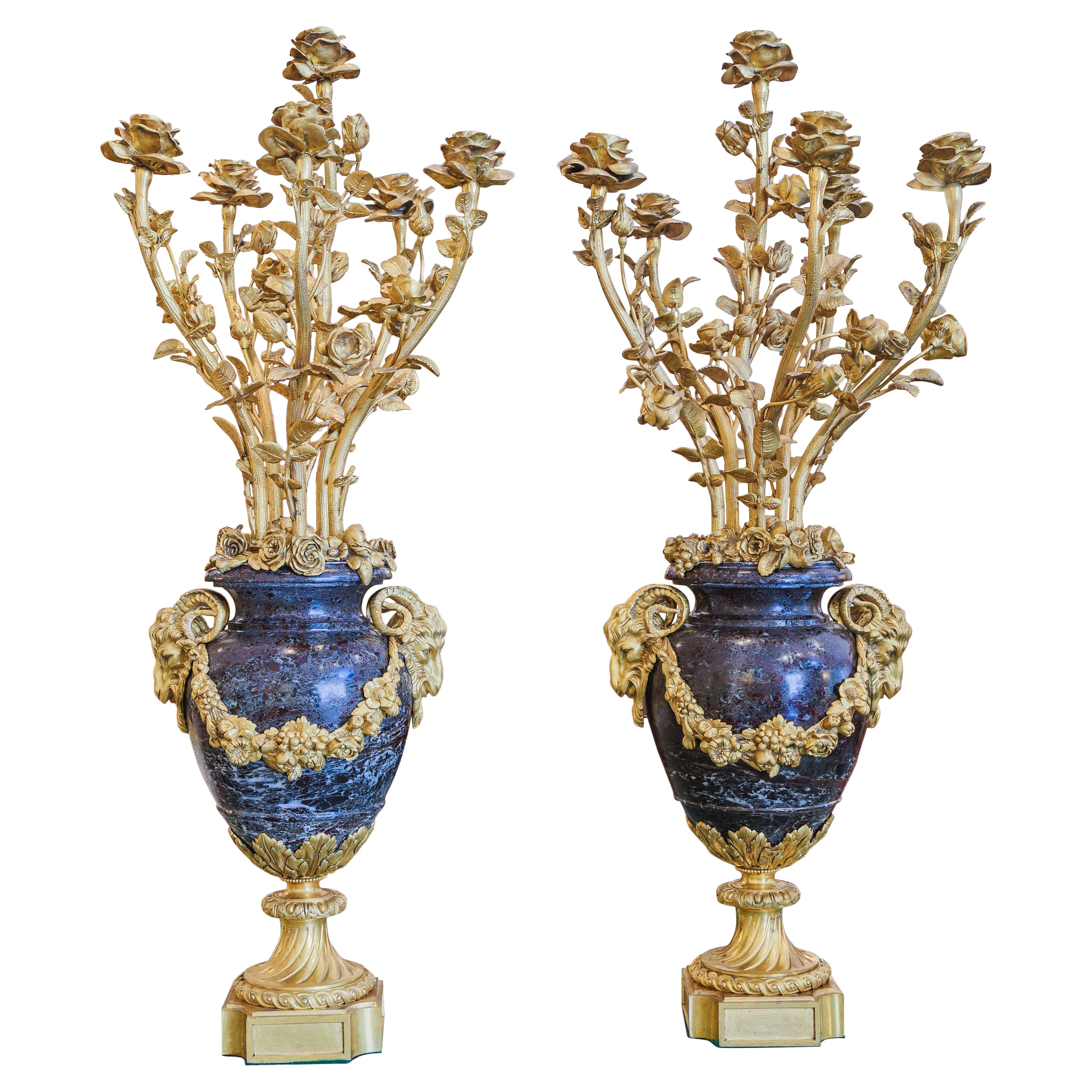 A fine pair of French gilt bronze and marble Louis XV candelabras