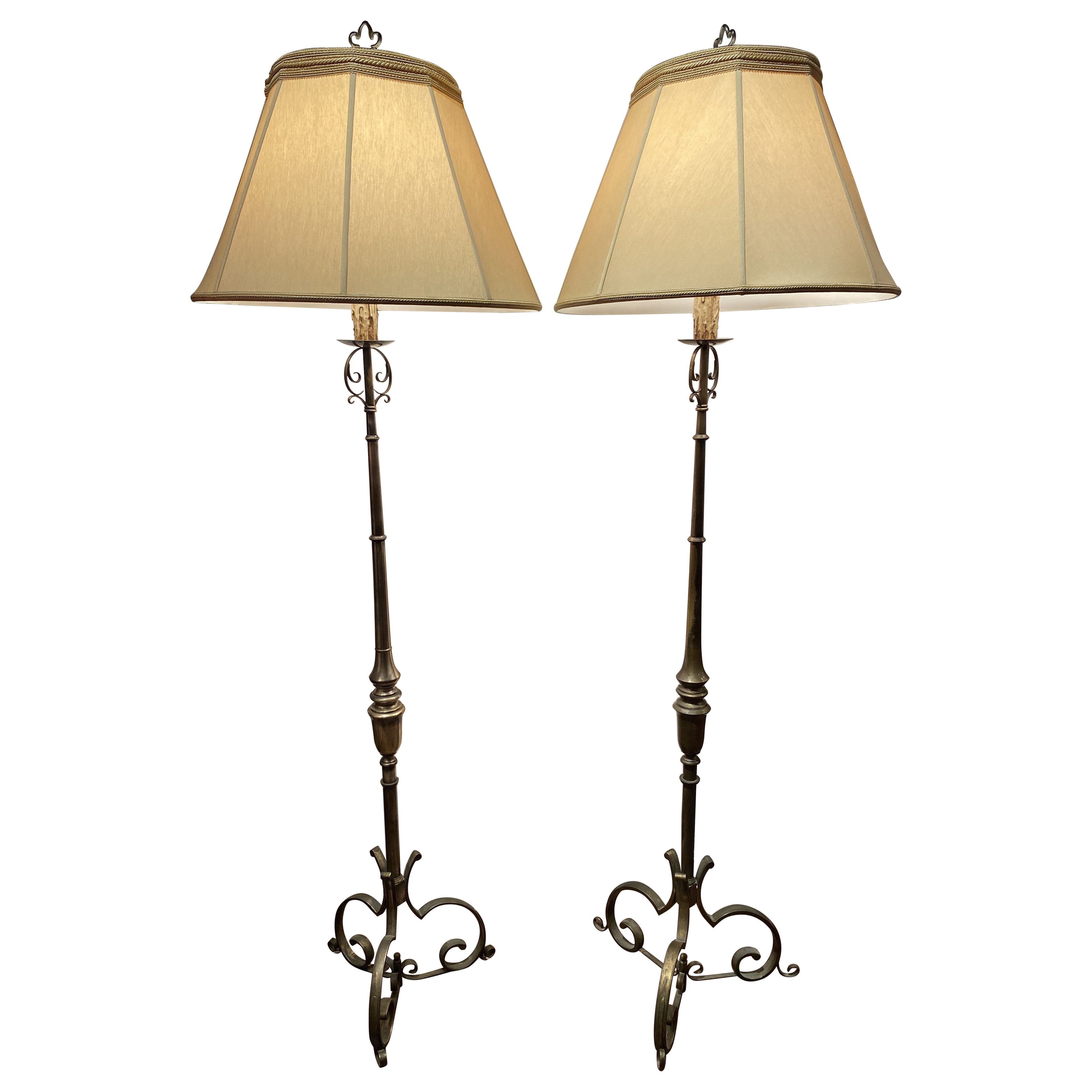 Pair of 20th c Hand Wrought Metal Torchiere Floor Lamps with Scrolled Bases