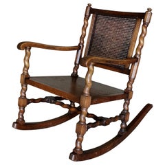 Signed 1928 Axel Einar Hjorth Rocking Chair for Nordiska Kompagniet. Solid Oak.
