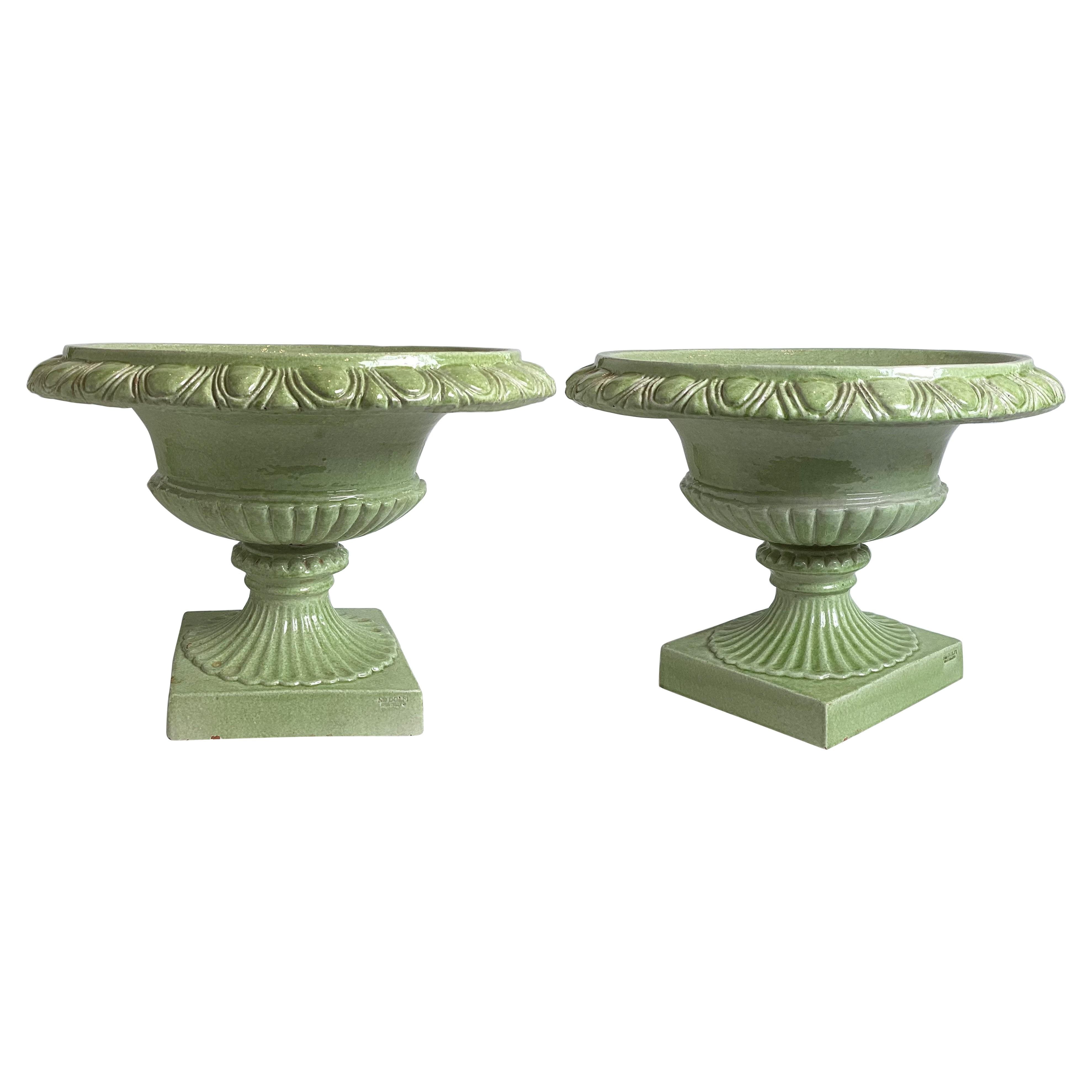 A Pair of Faience Green Italian Urns, retailed by Bergdorf Goodman For Sale