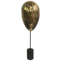 Stylized Female Face in Bronze