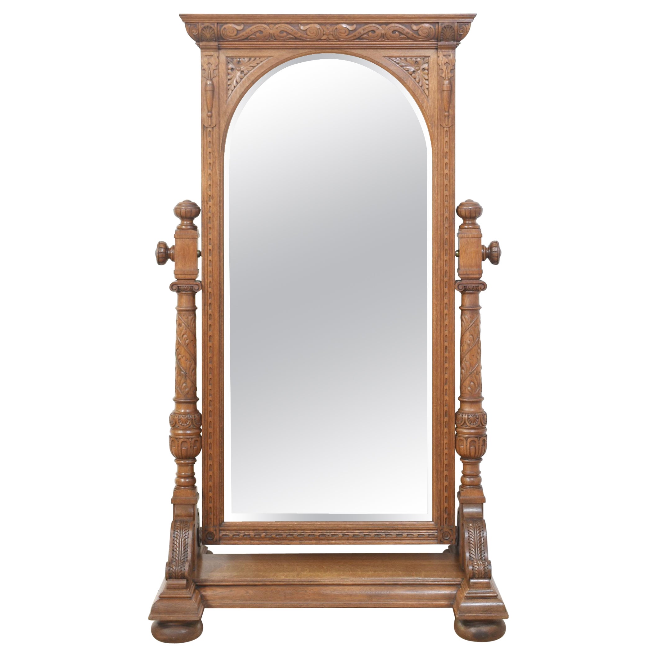 Carved oak cheval mirror