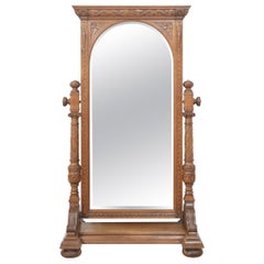 Carved oak cheval mirror