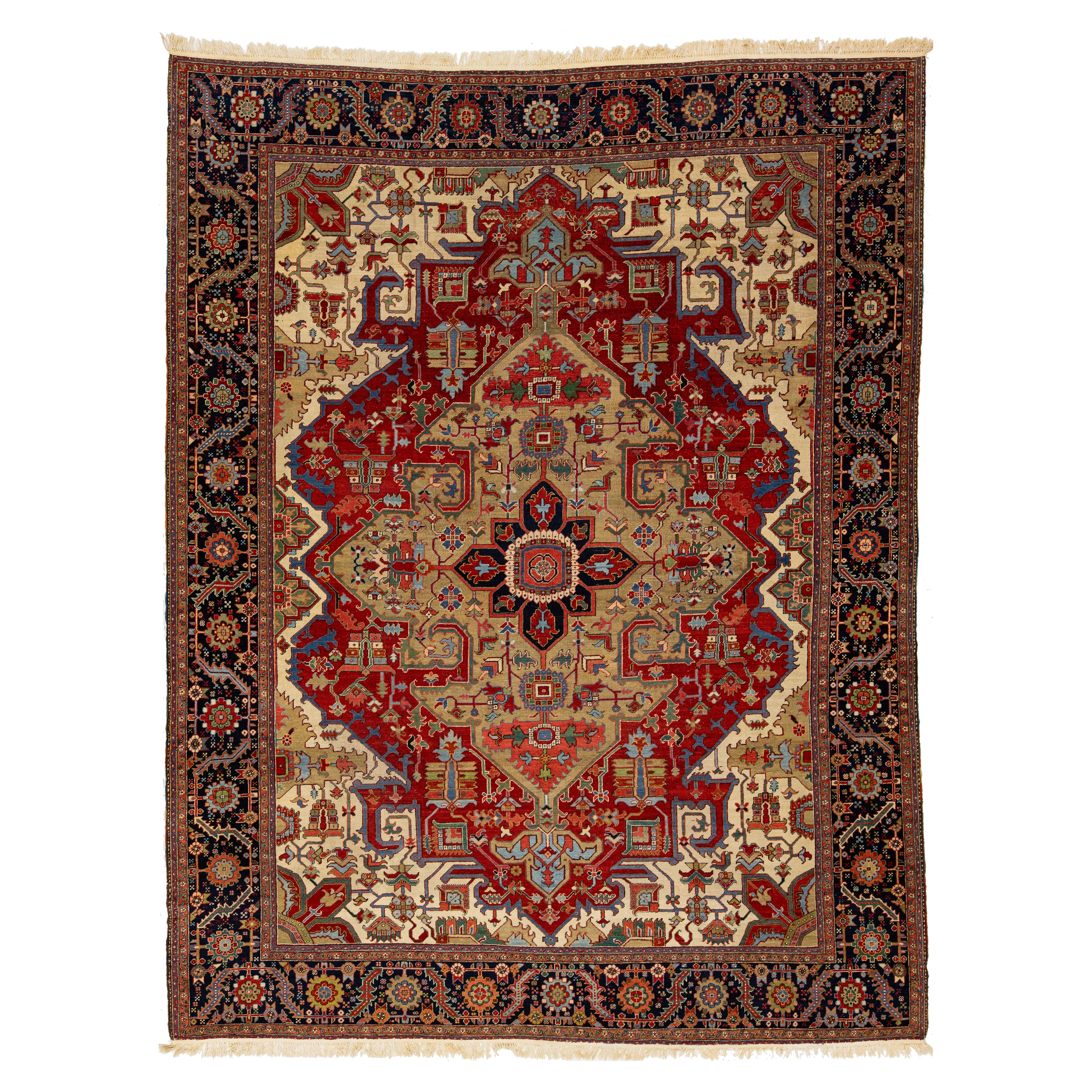 Unique 19th Century Persian Serapi Wool Rug Featuring a Red Medallion Design For Sale
