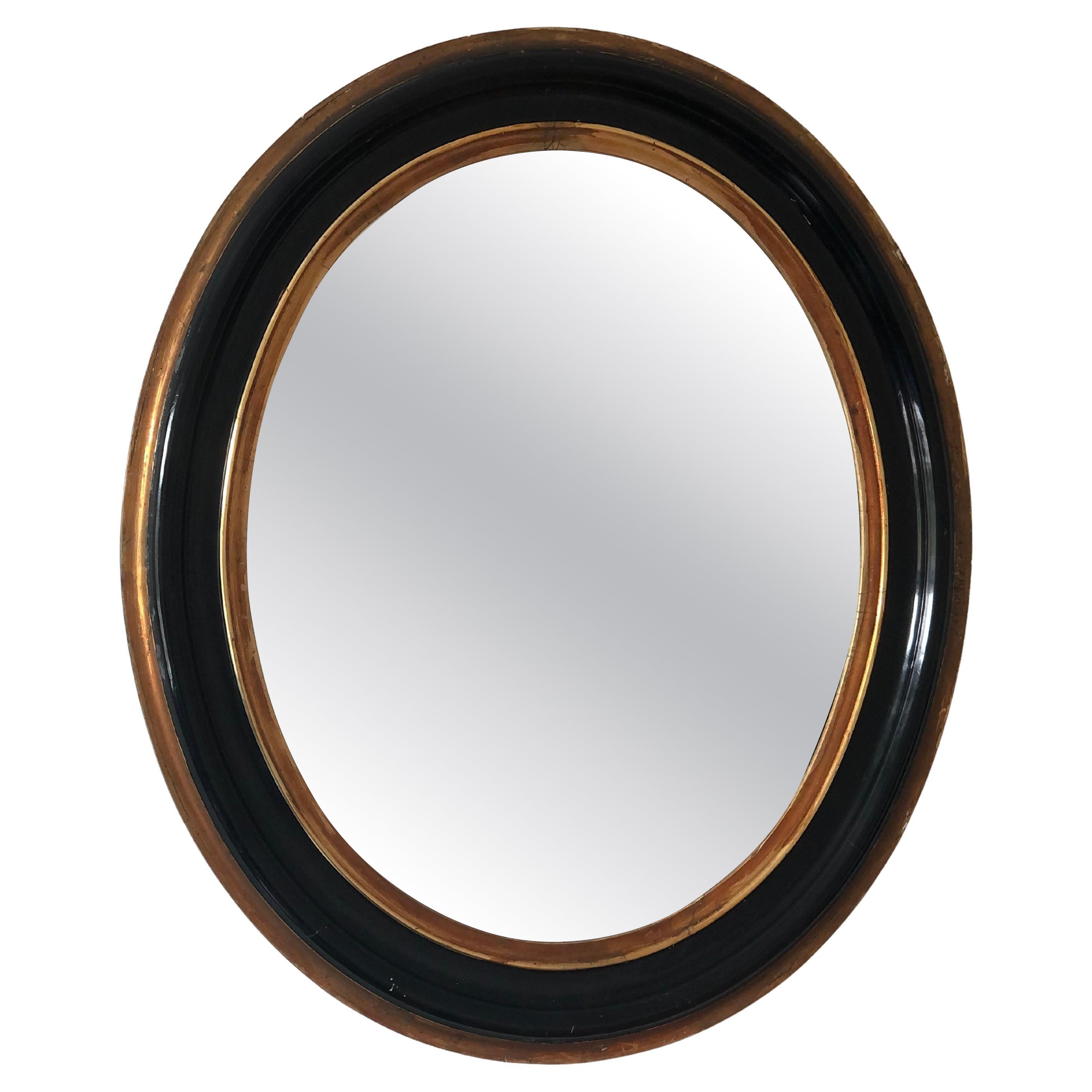 Antique Louis Philippe Oval French Mirror in Black and Gold Late 19th Century