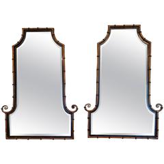 Pair of Smashing Faux Bamboo Gilt Metal and Ebonized Wood Mirrors