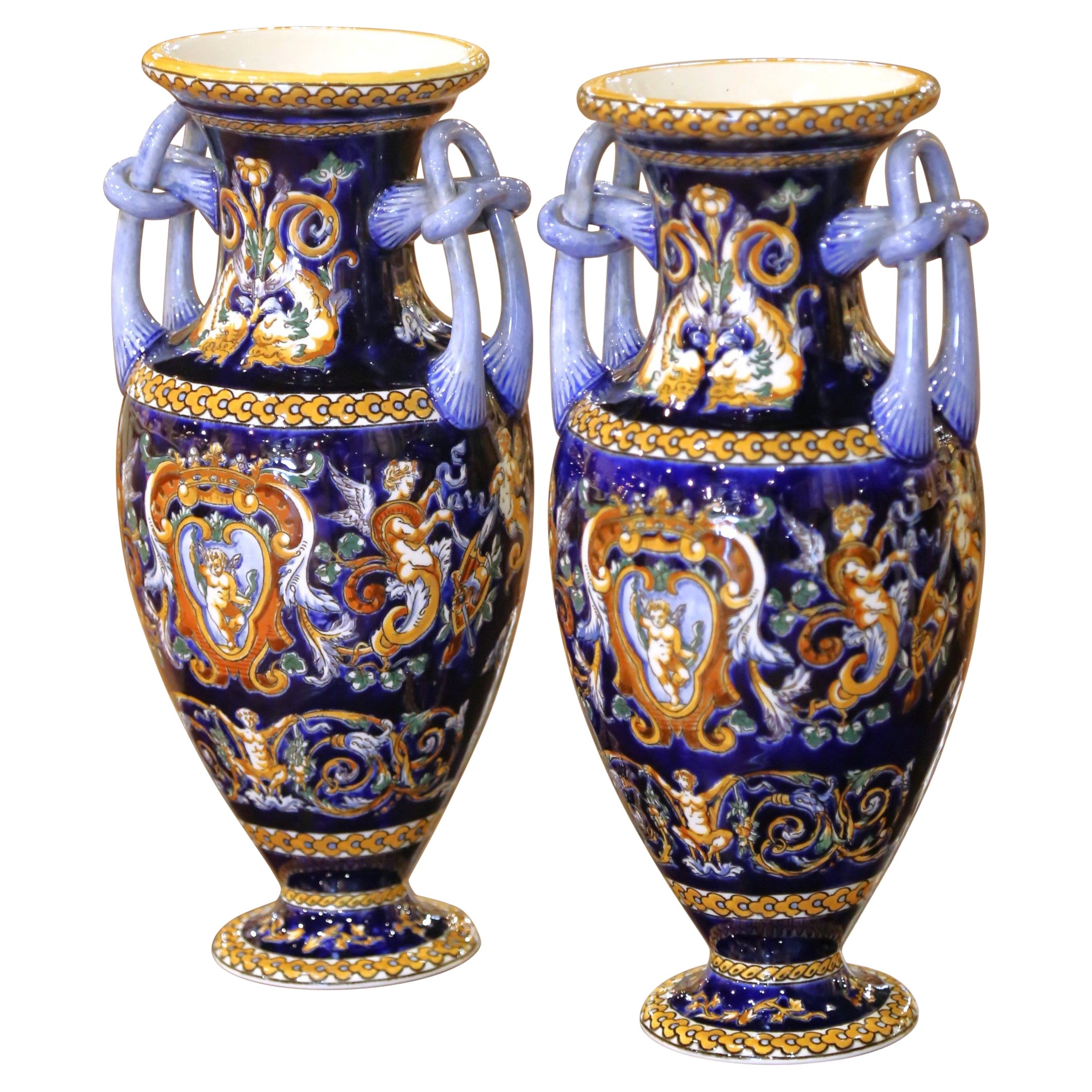 Pair of Early 20th C. Faience Vases with Hand-Painted Cherub Motifs from Gien For Sale