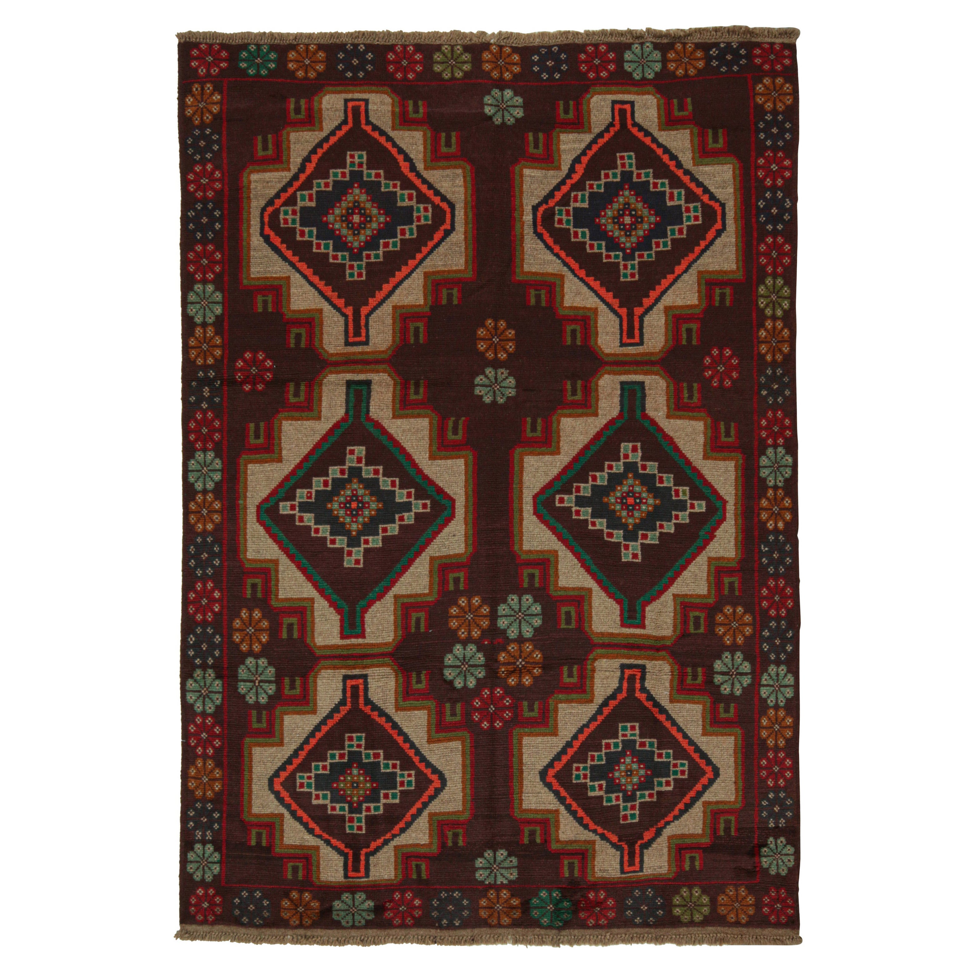 Rug & Kilim’s Afghan Baluch Tribal Rug in Rust Tones with Geometric Medallions For Sale