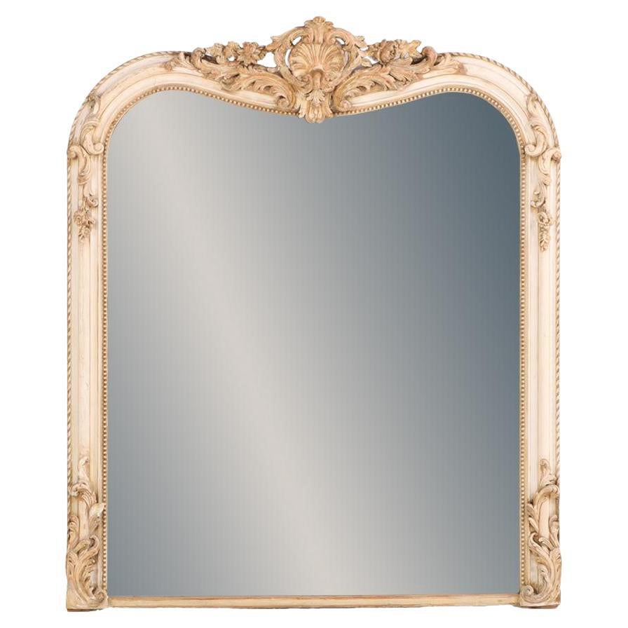 A French Louis XV style painted and gilt mirror, 19th C. For Sale