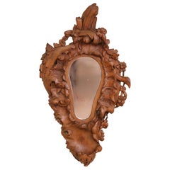 19th Century French Black Forest Carved Walnut Wall Mirror with Foliage Motifs