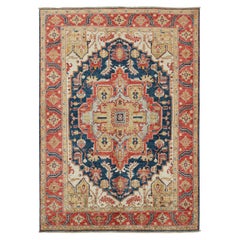 Tapis de style Serapi de Rug & Kilim en bleu marine avec médaillon or et rouge