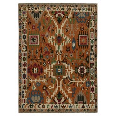 Tapis de style Oushak de Rug & Kilim en orange avec des motifs géométriques colorés