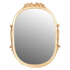 Miroir à bouclier doré