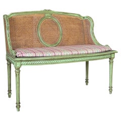 Antique Louis XVI Style Caned Settee With Distressed Green Painted Finish
