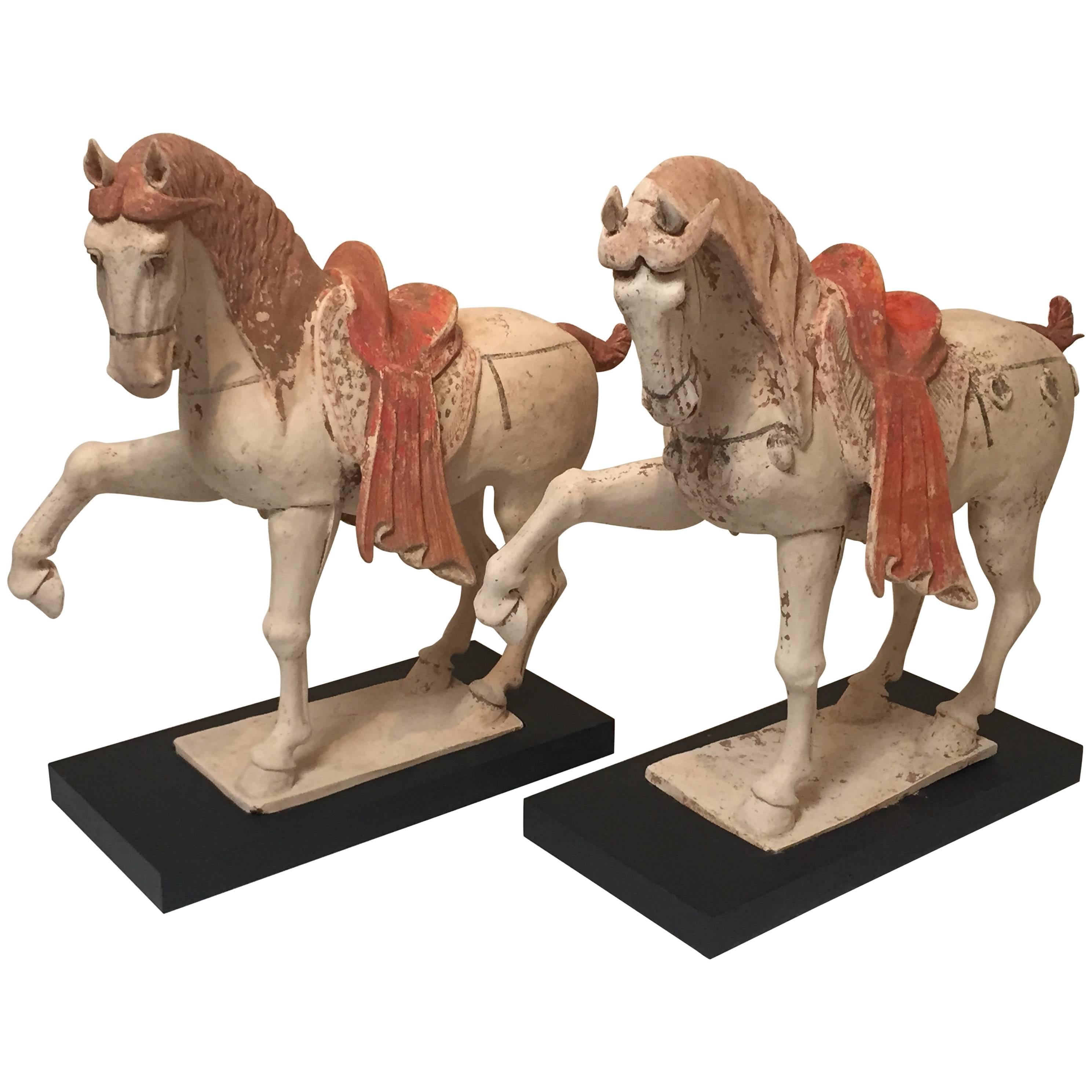 Pair of 8th Century Tang Dynasty Prancing Horses For Sale