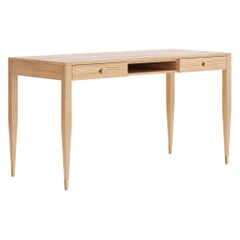Large oak desk with two solid drawers and shelf in mid century modern style