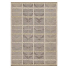 Rug & Kilim è un kilim in stile scandinavo con motivi geometrici e chevrons color grigio scuro.