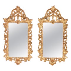 A Pair of Rococo Giltwood Mirrors