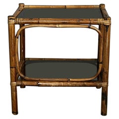 Table basse en bambou, avec deux étagères en verre fumé, années 1970, fabrication italienne