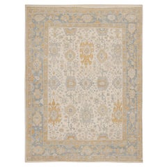 Rug & Kilim’s Oushak Rug in Beige, Gold and Blue Floral Patterns