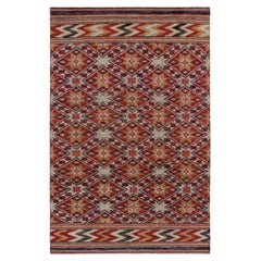 Rug & Kilim’s Moroccan Style Rug in Red with Gold Geometric Patterns
