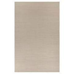 Rug & Kilim’s Oversized Contemporary Textural Solid Rug in Cream and White Tones