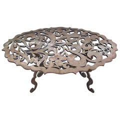 Mesa central de acero corten ornamentado