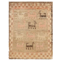 Alfombra persa vintage Gabbeh en beige-marrón con dibujos de animales - Rug & Kilim