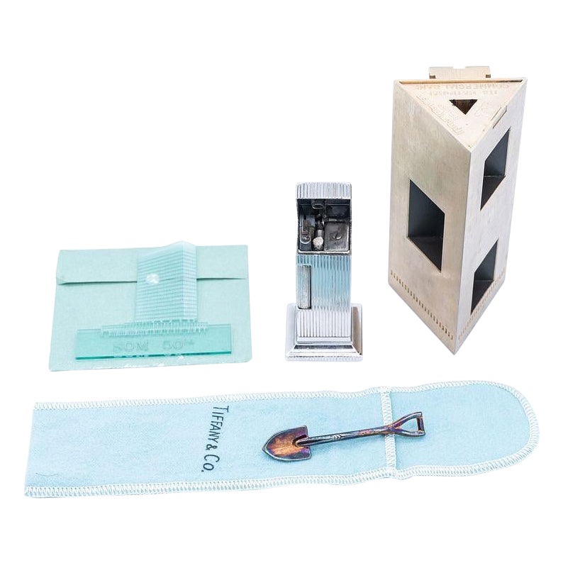Gordon Bunshaft's Collection: Lighter, Paperweight, Shovel Pin and Glass Piece