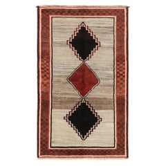 Tapis persan vintage Gabbeh, rouge et noir avec médaillons en forme de diamants - Rug & Kilim