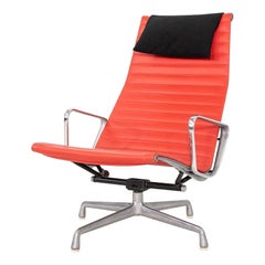 1970s Herman Miller Eames Lounge Chair in Red Naugahyde with Black Fabric Pillow