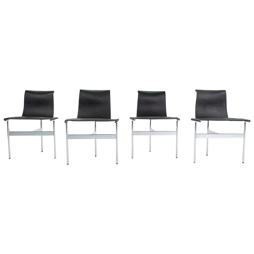 Juego de cuatro sillas de comedor Gratz TG-10 de cuero con armazón, hechas a medida