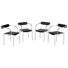 Ensemble de 4 chaises en métal tubulaire en cuir noir vintage et moderne