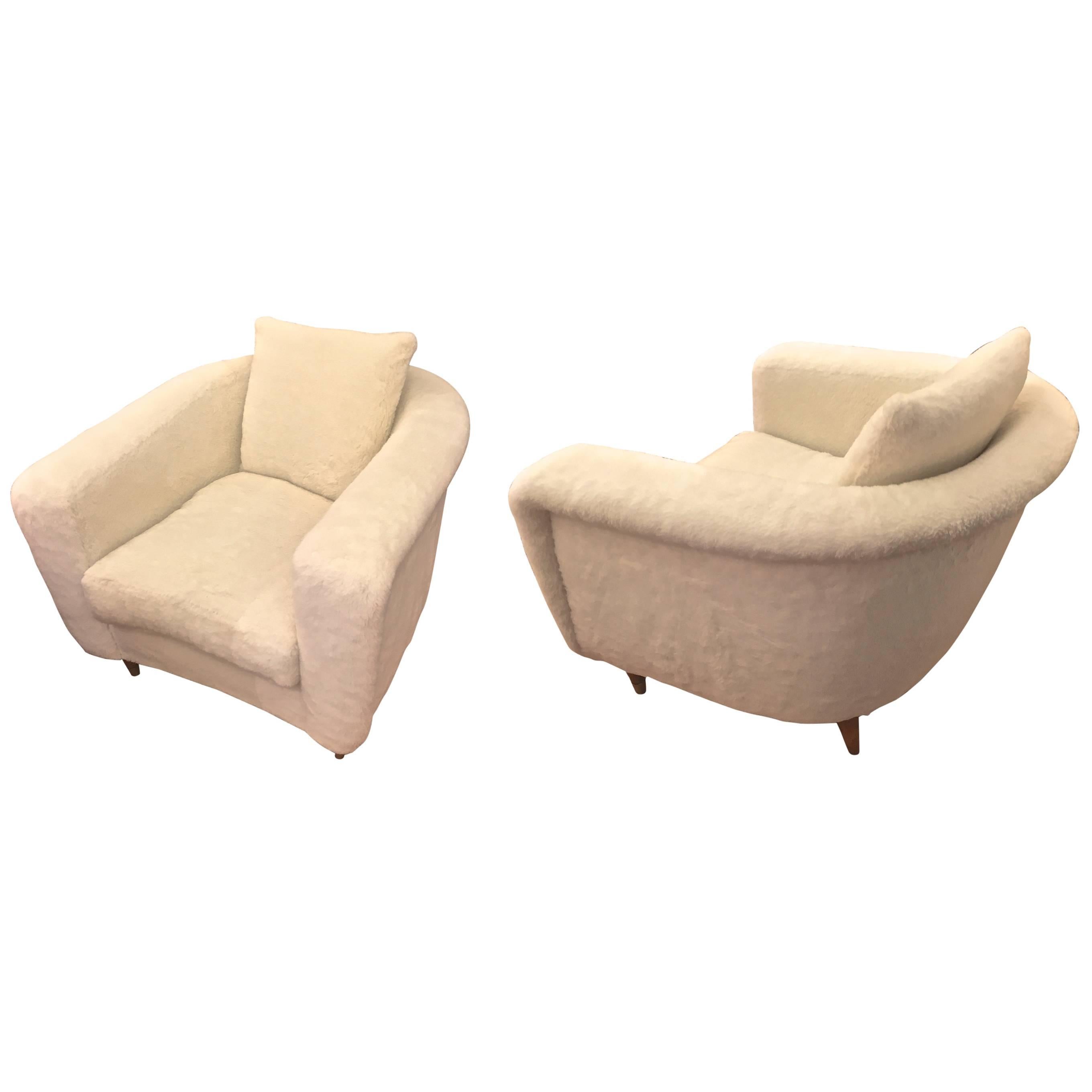 Jean Royère Pair of Armchairs with Tapered Metal Sabot Covered in Faux Fur For Sale