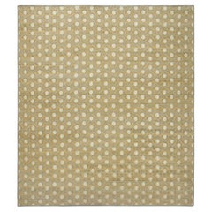 Rug & Kilim’s Oversized Block Print Rug in Gold with Cream Floral Patterns
