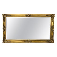 Specchio ornato in legno dorato belga con dettagli floreali rococò, XX secolo