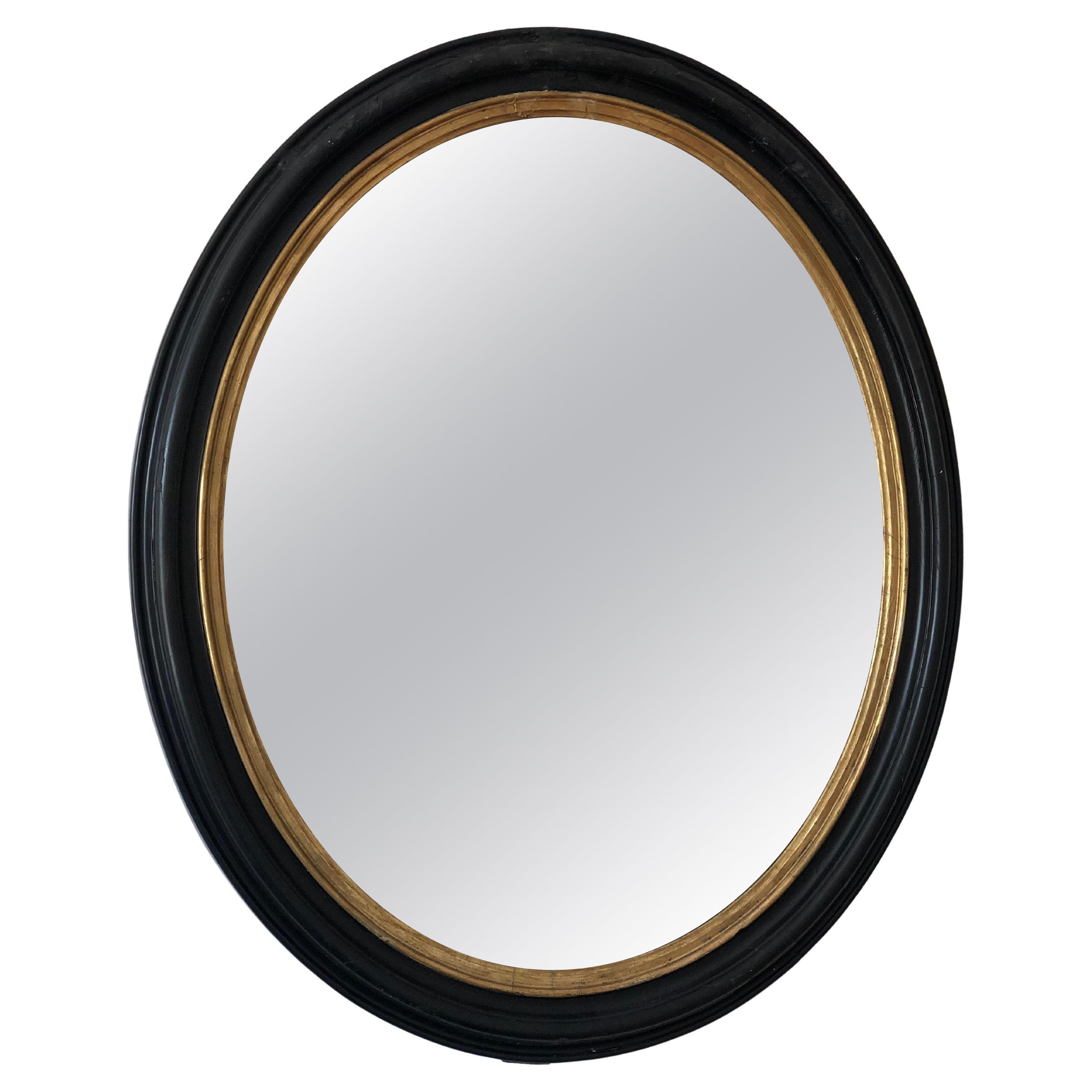 Large Antique Louis Philippe French Oval Mirror in Black and Gold, 19th Century For Sale