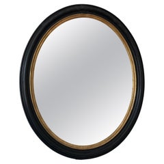 Large Antique Louis Philippe French Oval Mirror in Black and Gold, 19th Century
