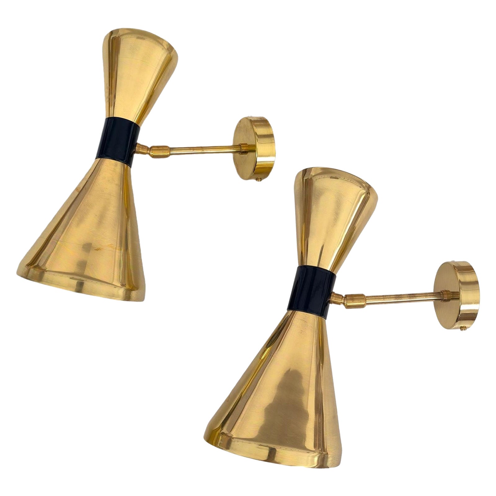 Diabolo Coppia di applique regolabili in ottone, nello stile di Stilnovo