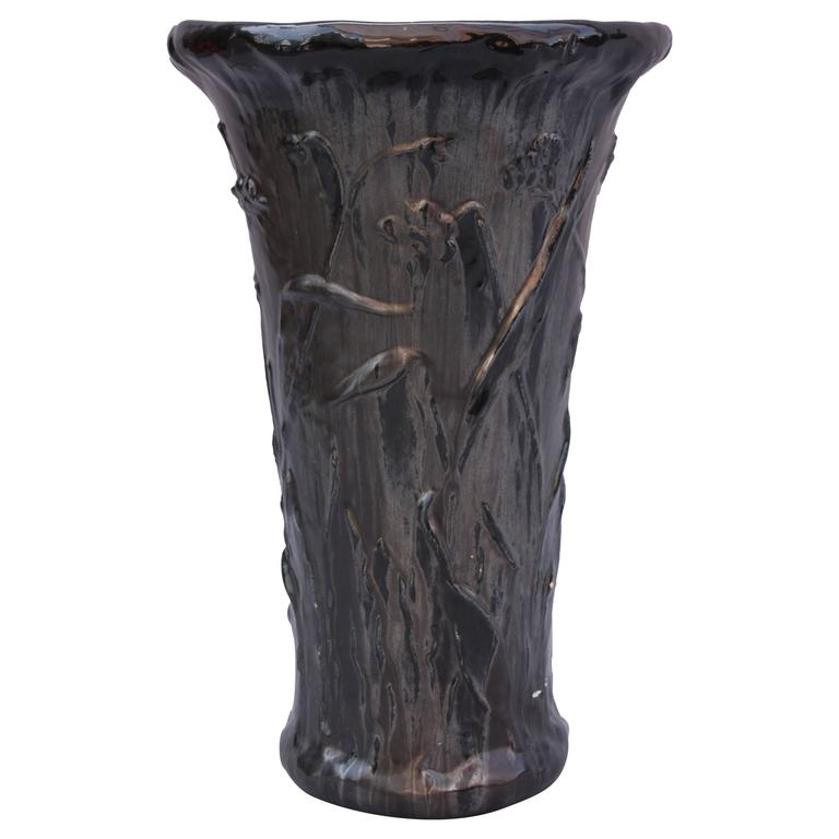 Tall Black Pottery Floor Vase with Raised Floral Motif at 1stdibs