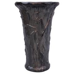 Tall Black Pottery Floor Vase with Raised Floral Motif