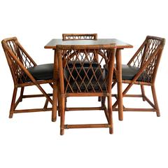 1950s Tommi Parzinger for Willow 
Reed Nine Piece Rattan Dining Set