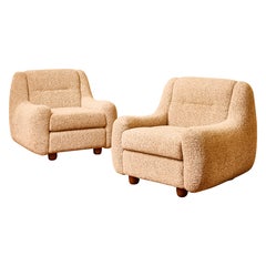 Pair of armchairs in bouclette fabric by Studio Glustin