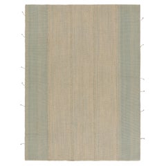 Rug & Kilim’s Contemporary Kilim with Textural Cream and Sky Blue Stripes