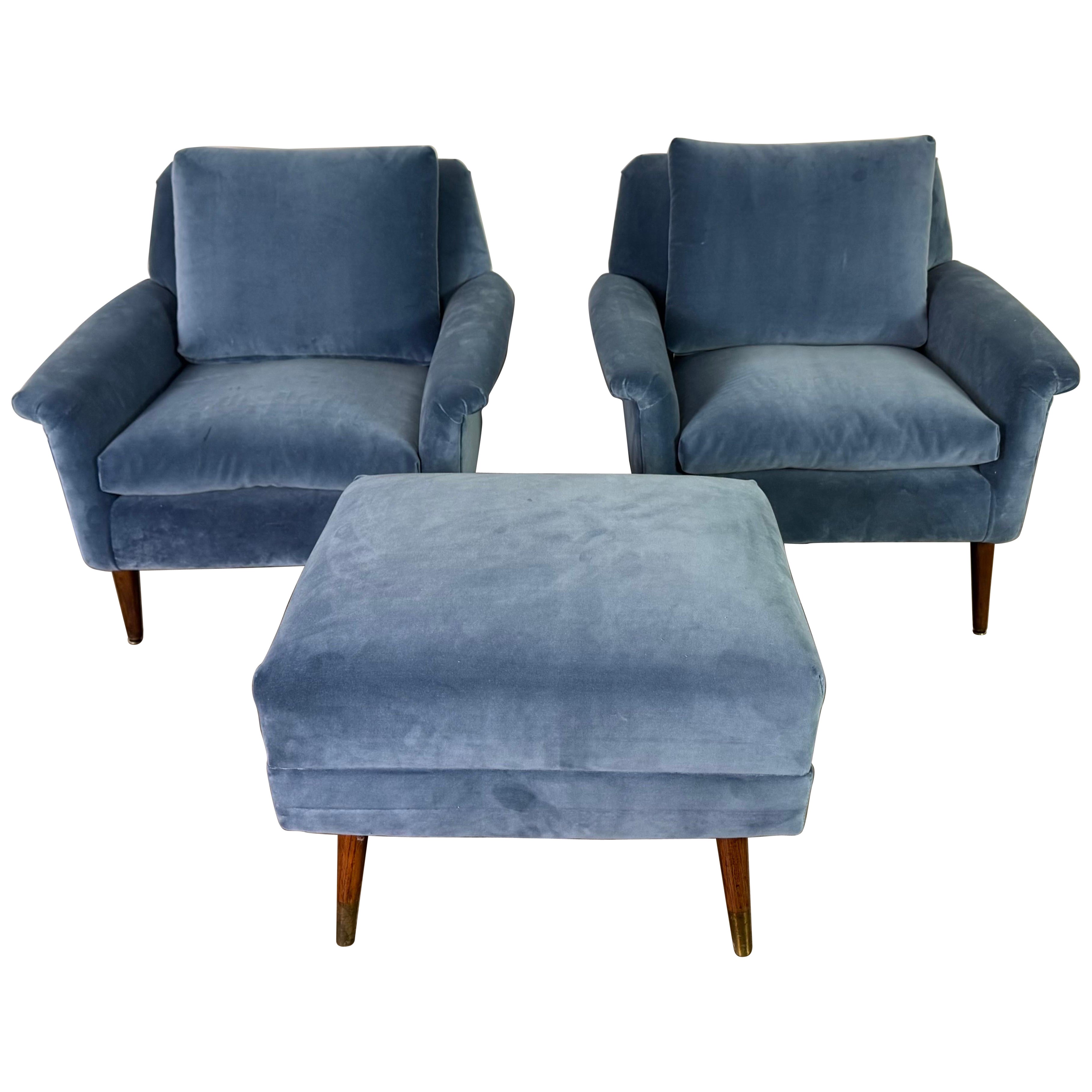 A pair of Mid-Century Modern lounge chairs designed by Folke Ohlsson For Sale
