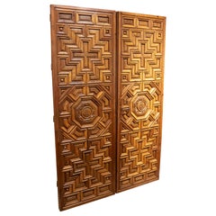 17th Carved Wooden Door with Mudejar Geometric Motif and Central Emblem