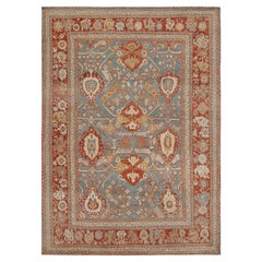 Rug & Kilim's Oushak Style Teppich in Rot, Blau und Braun mit Blumenmuster