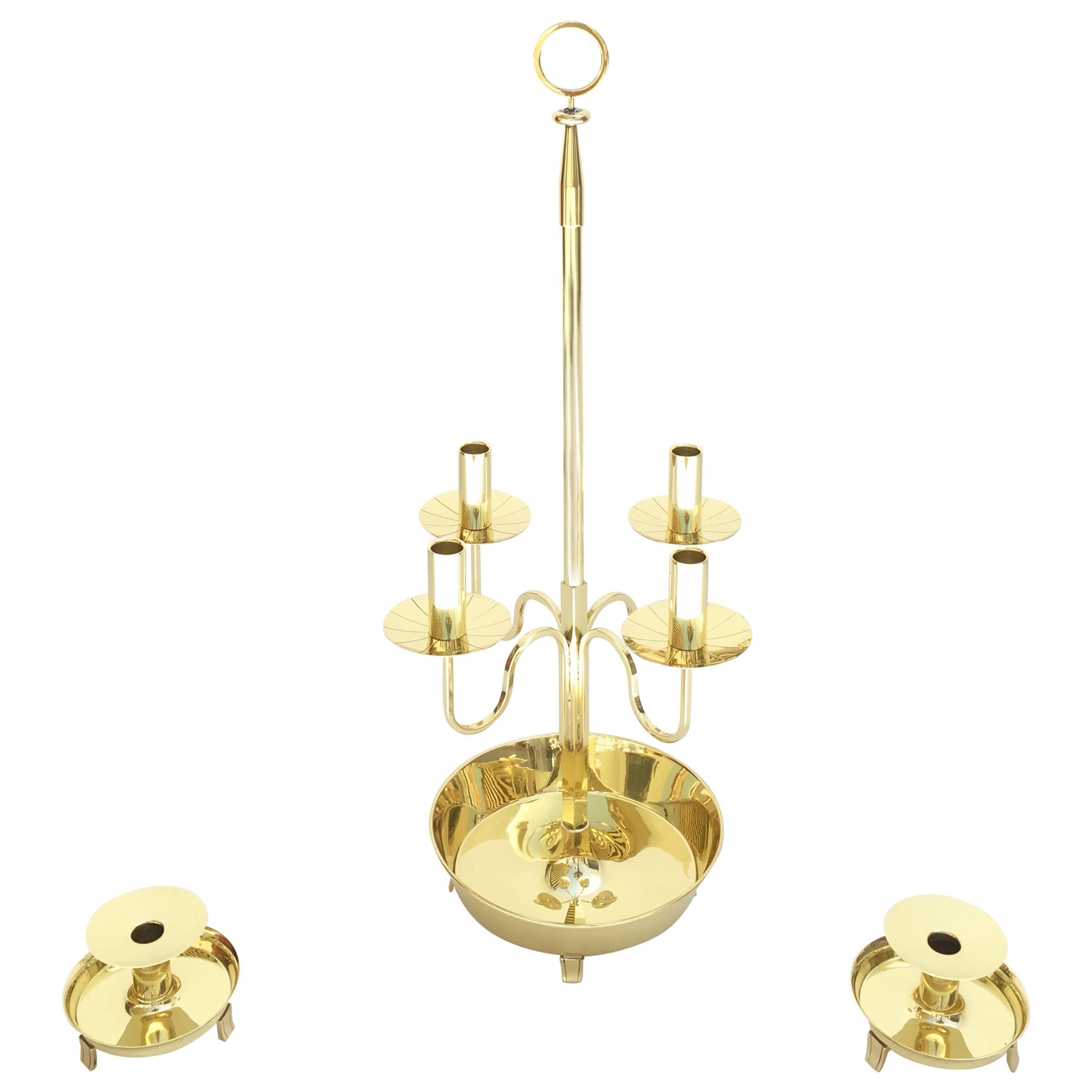 Polished Brass Three-Piece Candelabra Set by Tommi Parzinger For Sale