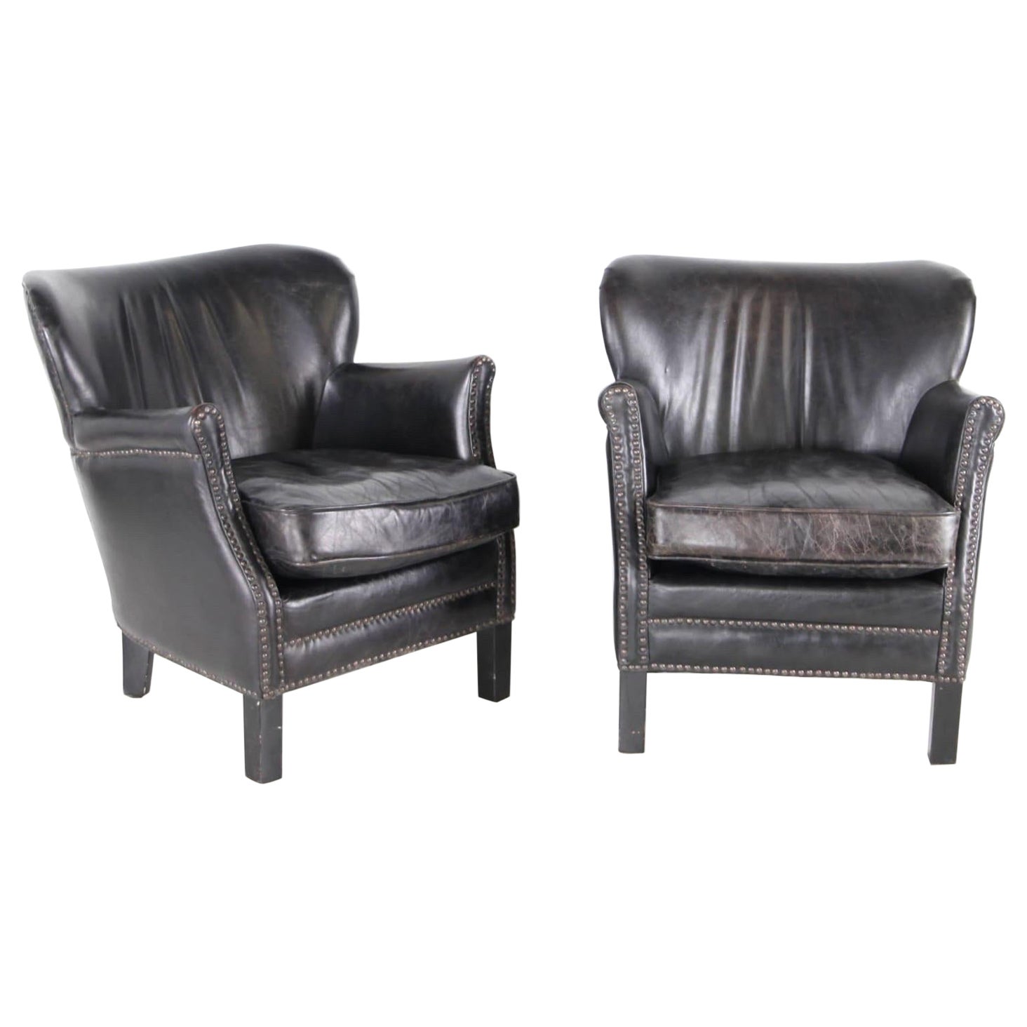 Pair of little leather club chairs en venta
