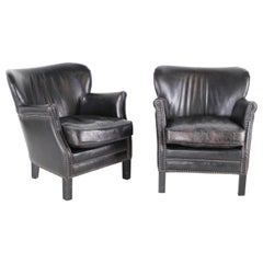 Pair of little leather club chairs